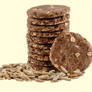 A-close-up-of-Ragi-and-Oats-cookies-layered-and-garnished-with-sunflower-seeds-emphasizing-a-wholesome-treat