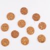 A-multigrain-cookie-cutter-and-a-cookie-sheet-placed-on-a-white-surface-ready-for-baking