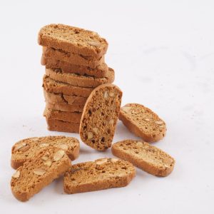 A-stack-of-almond-biscotti-arranged-neatly-on-a-white-background-showcasing-their-golden-brown-color-and-crunchy-texture