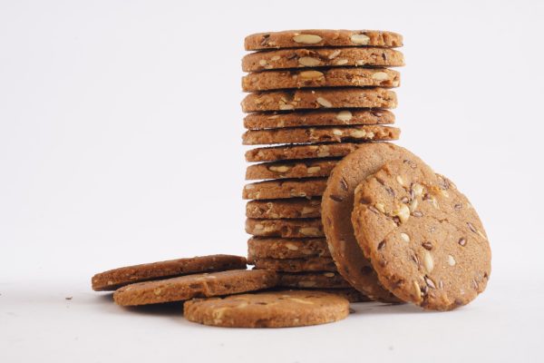 A-stack-of-multigrain-cookies-on-a-clean-white-background-showcasing-their-texture-and-color